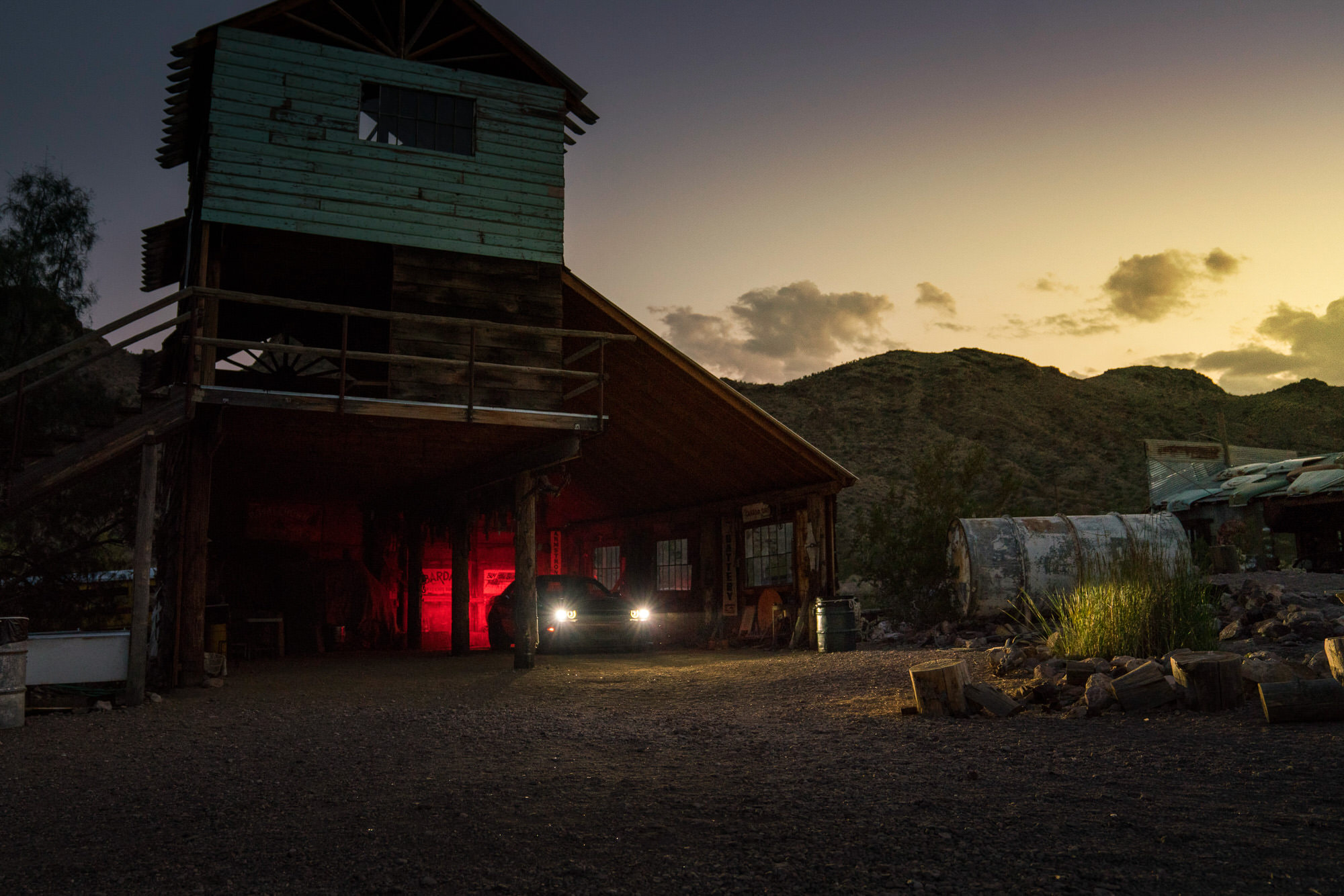 Dodge Demon in desert barn at sunset