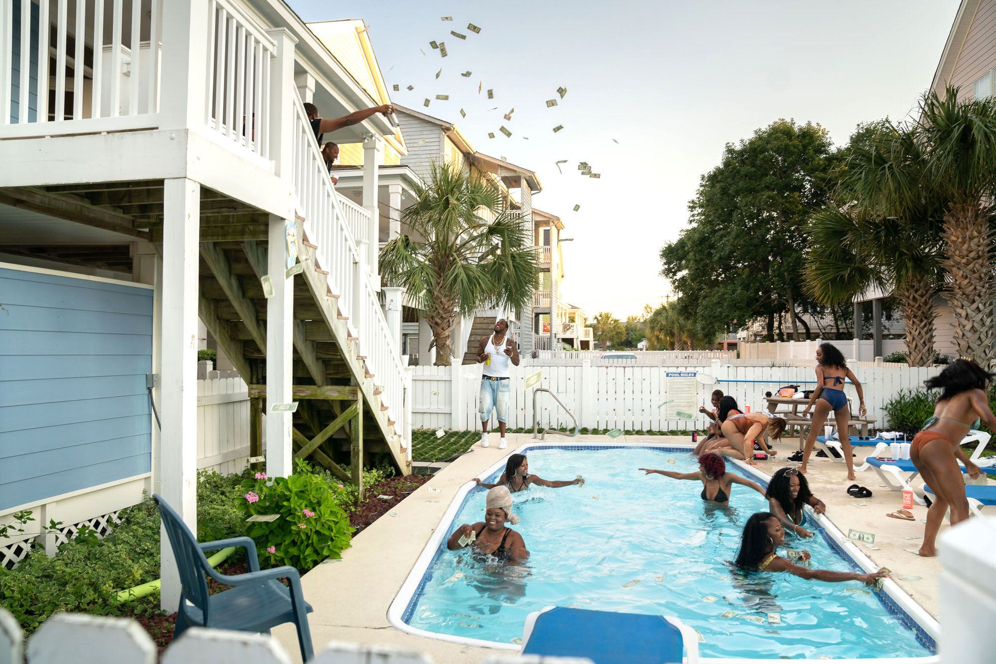 Country C and Donkmaster making it rain at the Myrtle Beach pool