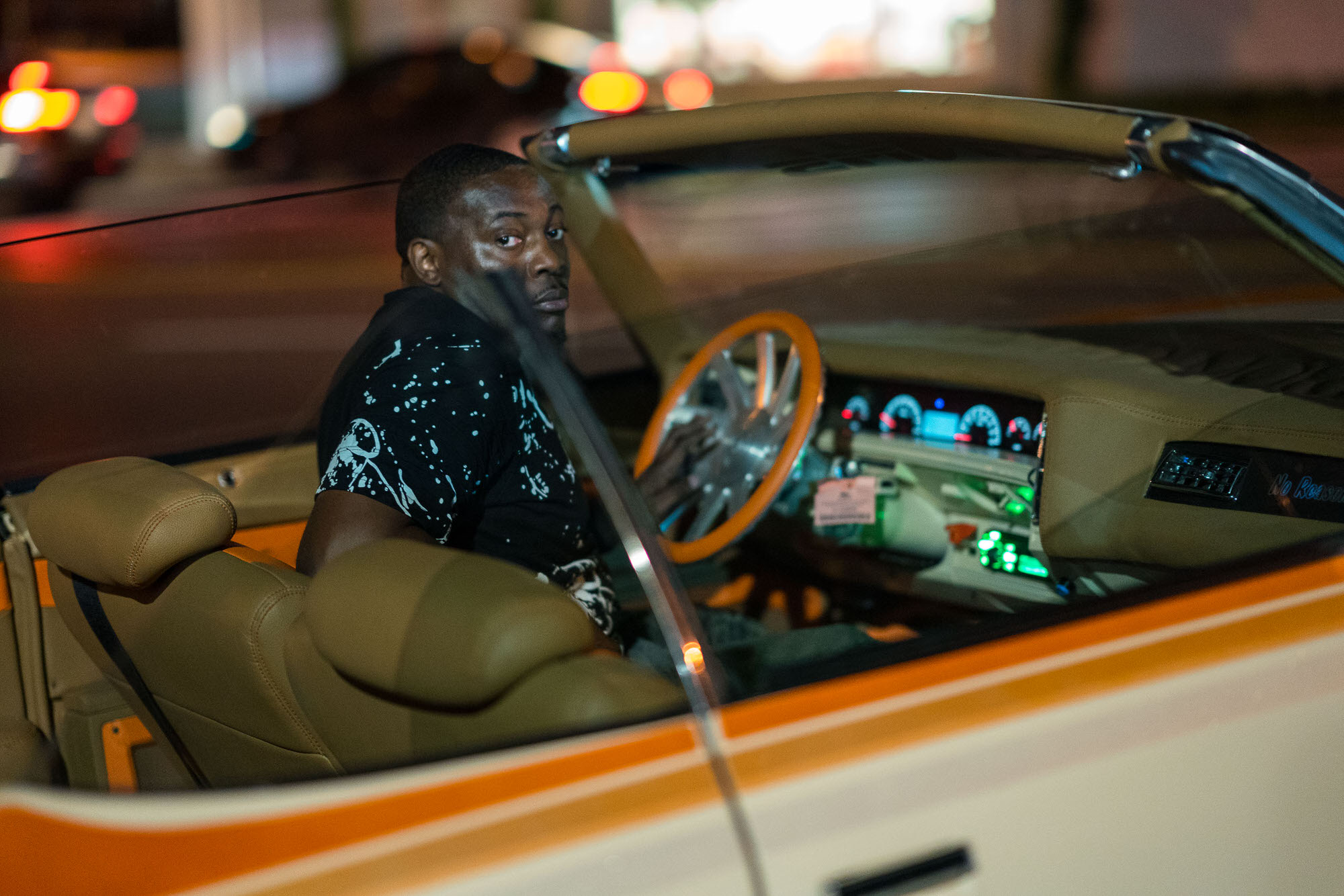 Rich Everythang driving a DONK