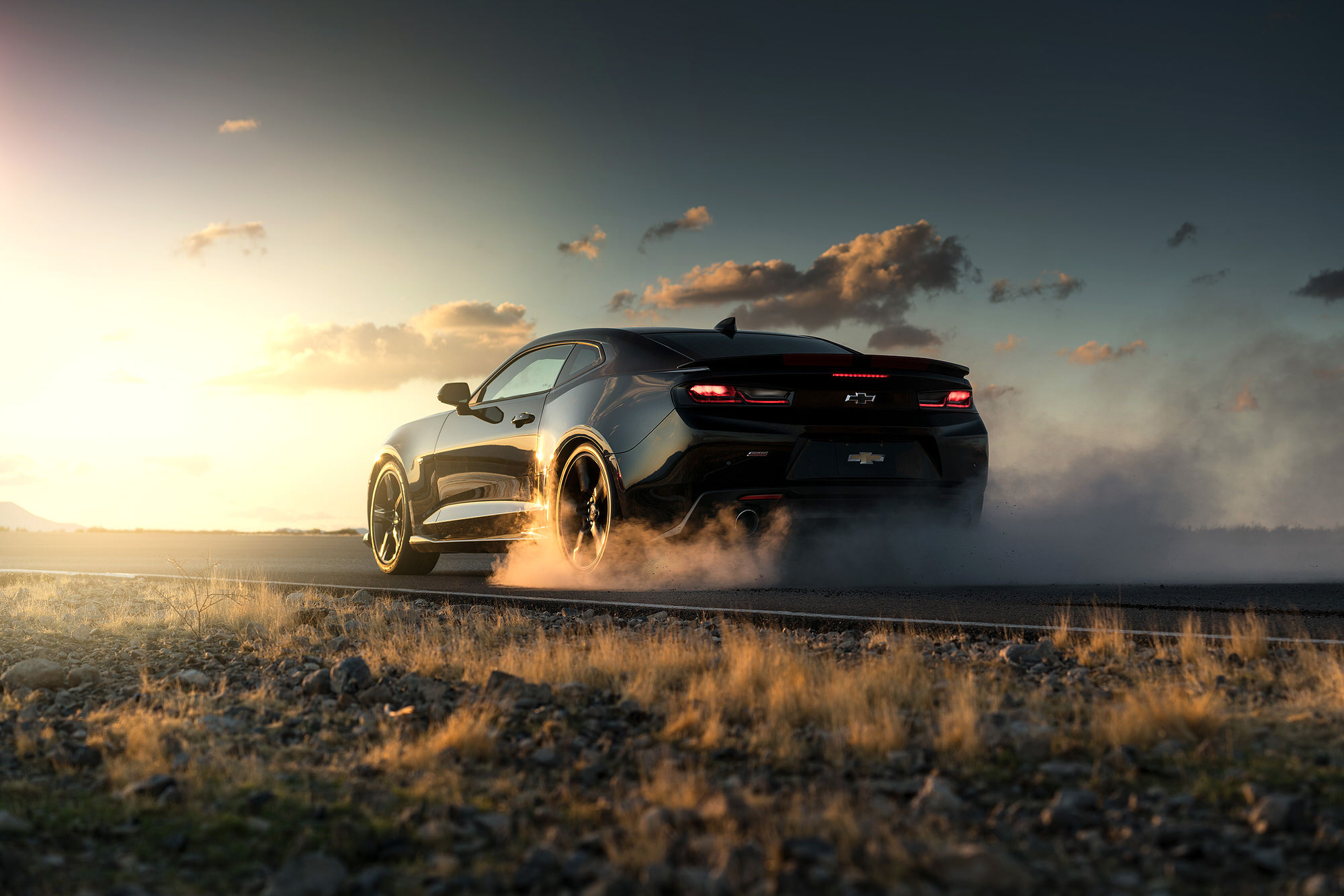 Burnout in the desert of Nevada in a black Chevrolet Camaro SS.
