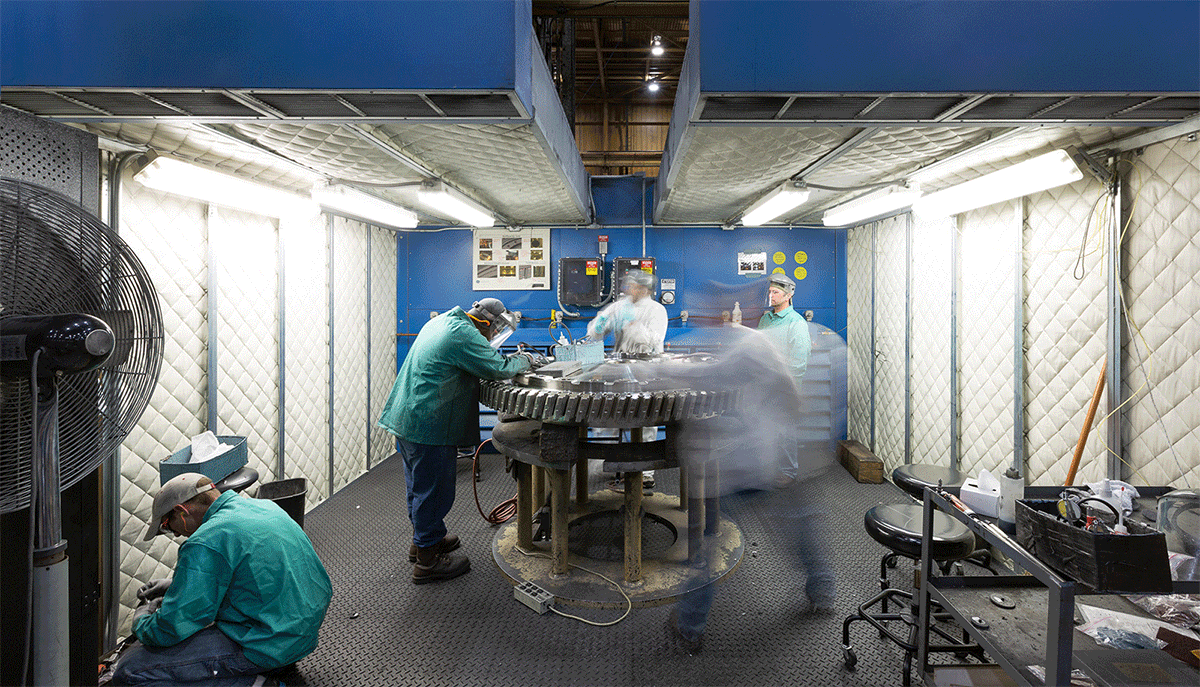 General Electric employees polishing a turbine in Greenville, SC.