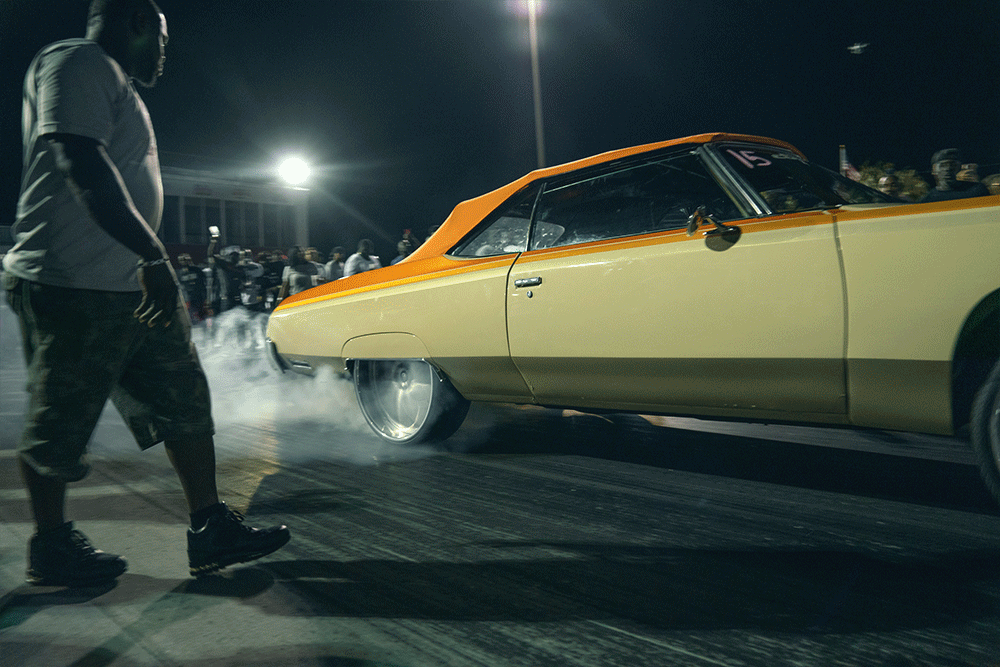 Country C Cantaloupe burnout surrounded by fans at Darlington Dragway