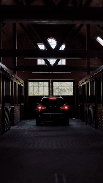 Mercedes-Benz SUV GLC exiting barn
