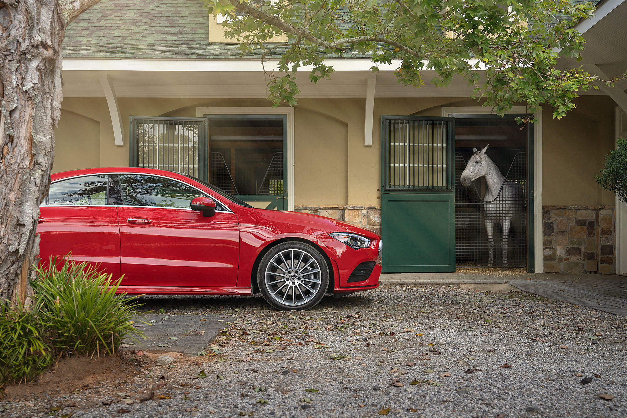 Mercedes-Benz red CLA horse barn