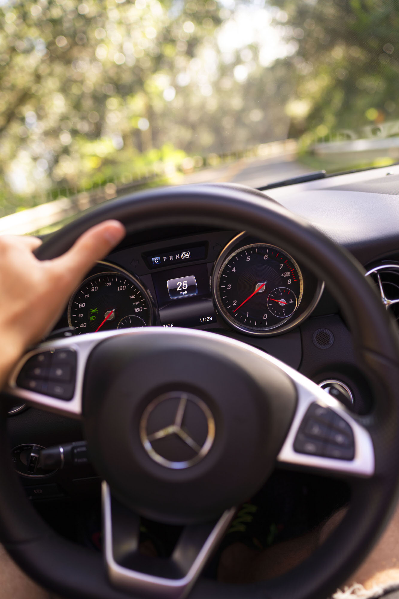 Speedometer of Mercedes-Benz SLC 300 driving through Maui, Hawaii